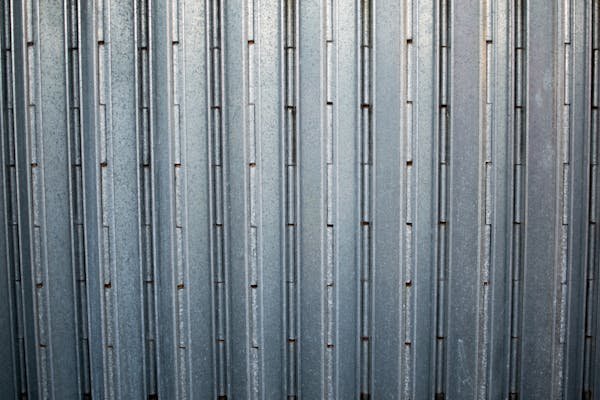Découvrez les atouts des portes accordéon industrielles sur mesure